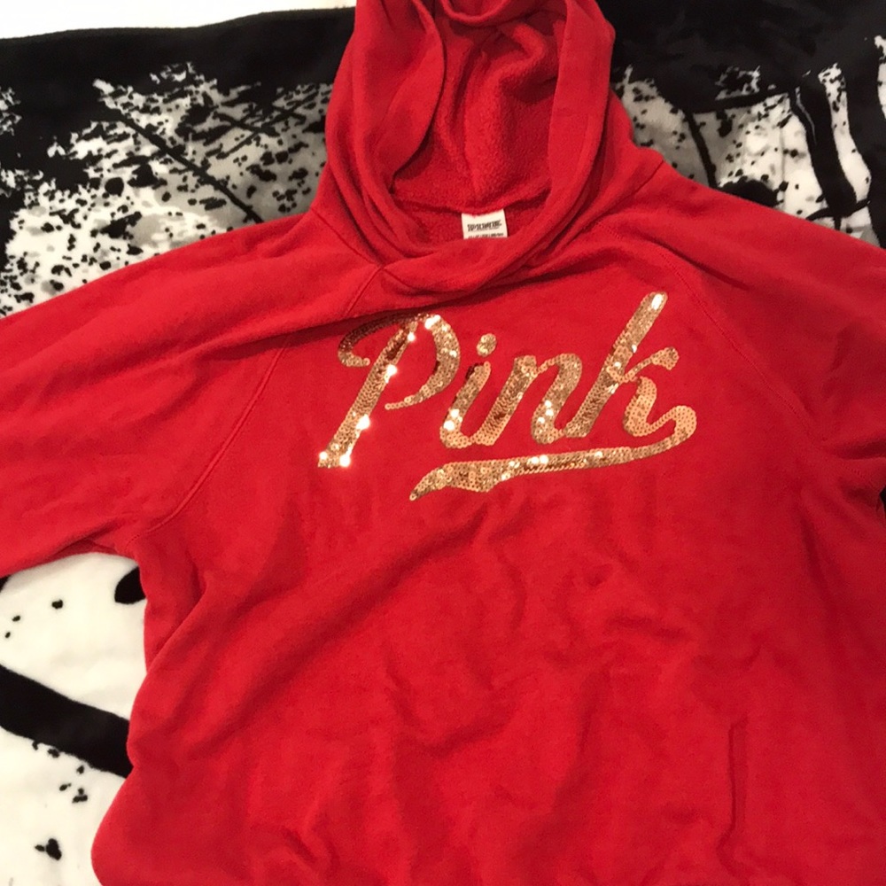 Red Victoria Secret hoodie.